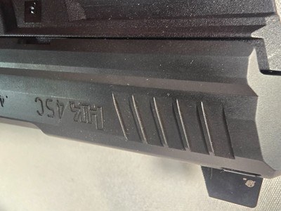 9345H&K 45C, 45 auto, 10 capacity Mag, green high viz sight, rail on bottom for light or Laser, threaded barrel, 4.5 barrel,More pictures at Daws - Image 11 of 18