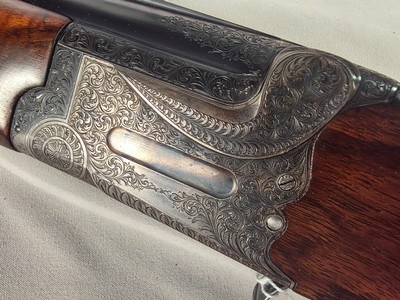 9366 Miroku Model 850, 12 Gauge over and under, Full/Full, Pistol grip, vent rib, 14 LOP, but pad, case color, engraving, gold trigger, 30” barrels, M - Image 7 of 25