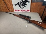 9378Browning safari, Belgium , 375 H+H, 24” barrels, custom checkered stock with cape buffalo, engraved floor plate, cheek piece,Leopold MX8 4x,