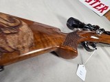 9374Browning Medallion, 7MM, 22” barrel, rosewood grip and forarm tip, muzzle brake, Leopold VX IIIHD 4.5x14x50, More pictures at DawsonsDoubles D - Image 23 of 24