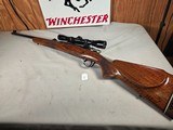 9374Browning Medallion, 7MM, 22” barrel, rosewood grip and forarm tip, muzzle brake, Leopold VX IIIHD 4.5x14x50, More pictures at DawsonsDoubles D