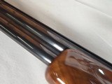 9375SKB 606 Ducks Unlimited Banquet, 12 Gauge, 28 Barrels, screw in chokes (2 SK, IC, M, F) wrench, and choke box, gold retriever with duck, pistol - Image 11 of 25