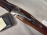 9375SKB 606 Ducks Unlimited Banquet, 12 Gauge, 28 Barrels, screw in chokes (2 SK, IC, M, F) wrench, and choke box, gold retriever with duck, pistol - Image 13 of 25