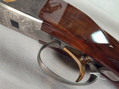9375SKB 606 Ducks Unlimited Banquet, 12 Gauge, 28 Barrels, screw in chokes (2 SK, IC, M, F) wrench, and choke box, gold retriever with duck, pistol - Image 24 of 25