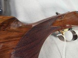 9375SKB 606 Ducks Unlimited Banquet, 12 Gauge, 28 Barrels, screw in chokes (2 SK, IC, M, F) wrench, and choke box, gold retriever with duck, pistol - Image 23 of 25