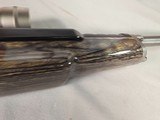 9381Ruger Ranch, Target, 222 Cal, muzzle brake, laminated thumb hole stock, Burris scope 4.5x14x40, 2 mags, More pictures at DawsonsDoubles DOT COM - Image 13 of 25