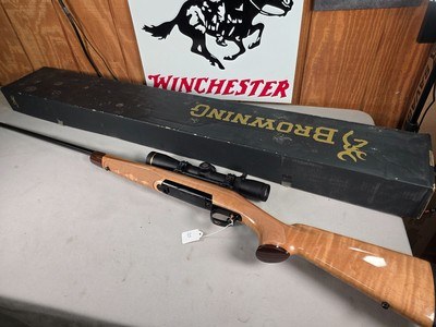 9397Browning Medallion, T-bolt, 300 Win Mag, 24” Barrels, 2 “ muzzle brake, rosewood caps, maple tiger stripped wood, AA+ stock, Leopold VX3HD 3.5x1 - Image 1 of 25
