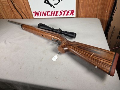 9379Savage Model 12, 22-250,laminated stock, steel barrel, ebony forend cap, 24: barrel, Whitetail 6.5x20x50 scope,More pictures at DawsonsDoubles - Image 1 of 25