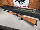 9398Browning X Bolt, 270 Cal, 22” barrel, Rosewood cap, muzzle brake, Leupold 3.5x10x40 , Tiger striped wood, with box, More pictures AT DawsonsDoub