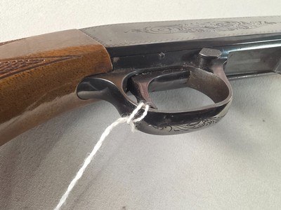 9382Browning SA 22 Long Rifle, 22” barrel, flip up sight, loads though the butt stock, More pictures at DawsonsDoubles DOT COM - Image 16 of 21