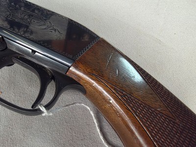 9382Browning SA 22 Long Rifle, 22” barrel, flip up sight, loads though the butt stock, More pictures at DawsonsDoubles DOT COM - Image 6 of 21