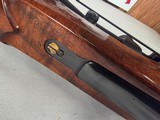 9417Mauser 98 Custom, 240 cal mag, rosewood cap, cheek piece, Hardline crimson trace 4x12x40, thumb hole stock, More pictures at DawsonsDoubles Dot - Image 13 of 25