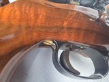 9417Mauser 98 Custom, 240 cal mag, rosewood cap, cheek piece, Hardline crimson trace 4x12x40, thumb hole stock, More pictures at DawsonsDoubles Dot - Image 22 of 25