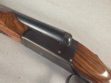 9419LC Higgins made by AFA, 12 Gauge, 28” barrels, M/F, Single trigger, custom checkered stock, butt pad, pistol grip, 14 1/2 LOP, More pictures at - Image 11 of 25