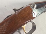 9403SKB 385 12 Gauge, 28” barrels, single non selective trigger, ejectors, pistol grip, butt pad, silver receiver, with engraving, auto safety remov - Image 19 of 23