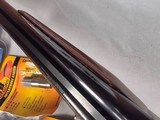 9403SKB 385 12 Gauge, 28” barrels, single non selective trigger, ejectors, pistol grip, butt pad, silver receiver, with engraving, auto safety remov - Image 12 of 23