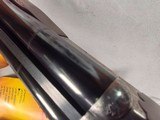 9403SKB 385 12 Gauge, 28” barrels, single non selective trigger, ejectors, pistol grip, butt pad, silver receiver, with engraving, auto safety remov - Image 11 of 23