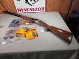 9403SKB 385 12 Gauge, 28” barrels, single non selective trigger, ejectors, pistol grip, butt pad, silver receiver, with engraving, auto safety remov - Image 3 of 23