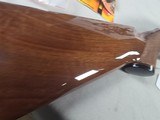9403SKB 385 12 Gauge, 28” barrels, single non selective trigger, ejectors, pistol grip, butt pad, silver receiver, with engraving, auto safety remov - Image 20 of 23