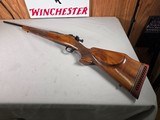 9427Remington 03-A3 sporter, 30-06, tapered barrel, engine turned bolt, diamond wooden in lays, plow shoe, pistol grip cap, soft pachmayer pad, tape