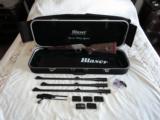 BLASER R8 LUXUS RIFLE WITH 3 BARRELS .30-06, .300 WIN, .375 H&H NEW NEVER USED - 1 of 14