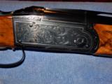 Krieghoff K80 Silver Superscroll 32" plus 32" carrier barrel with Briley 20, 28 and 410 tubes - 1 of 12