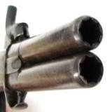 English over/under percussion swivel barrel pistol.
(AH2816) - 5 of 8