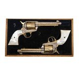 "Cased Pair of Cattle Brand Engraved Colt Single Armies (C19529)"