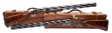 "J. PURDEY & SON CASED CONSECUTIVE PAIR OF KEN HUNT ENGRAVED O/U 12 GAUGE BEST GUNS (L2025-12509/10)"