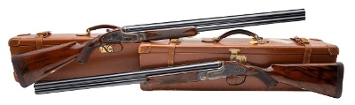 "J. PURDEY & SON CASED CONSECUTIVE PAIR OF KEN HUNT ENGRAVED O/U 12 GAUGE BEST GUNS (L2025-12509/10)"