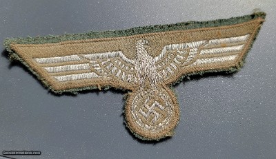 German WW II silver wire brocade breast eagle used by officers and EM NICE.