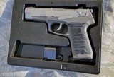 Gorgeous Ruger P89 2-tone 9mm pistol unfired in factory case with mag loading tool. - 2 of 6