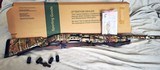 Mossberg 500 12-gauge shotgun in box w/vent barrel camo super nice shotgun.
