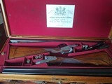 Pair of 12 bore sidelock ejector James Woodward guns - 1 of 15