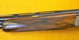 One of a Kind Caesar Guerini Ivictus V 12ga 30" W/ Silver Inlays
- 4 of 9