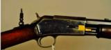 Colt Lightning, .22 cal. slide action rifle.
- 1 of 8