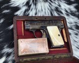 1925 Colt Model 1908 Case Colored W/ Preban Ivory Grips, Unfired in Wood Presentation case. Gorgeous - 1 of 12
