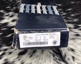 Smith and Wesson 586-1, Nickle “Distinguished Combat Magnum” 4 inch, 98% - 11 of 17