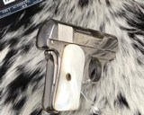 1920 Colt model 1908 Hammerless .25 acp, Nickel W/ Mother of Pearl grips, boxed - 14 of 18