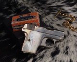 1920 Colt model 1908 Hammerless .25 acp, Nickel W/ Mother of Pearl grips, boxed - 10 of 18