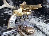 1955 Smith & Wesson Pre-18 , .22 Combat Masterpiece, Factory Engraved, Gold W/Mother of Pearl - 24 of 25