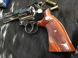 Sold layaway-1982 Smith & Wesson model 586 no-dash,
“Distinguished .357 Combat Magnum Revolver “ Nickel, Boxed, 4 inch. - 19 of 25