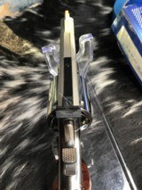 Sold layaway-1982 Smith & Wesson model 586 no-dash,
“Distinguished .357 Combat Magnum Revolver “ Nickel, Boxed, 4 inch. - 22 of 25