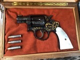 S Prefix Engraved Smith & Wesson, M& P ,Mother of Pearl Grips W/Gold Inlay, Cased.
Trades Welcome - 2 of 22