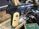 1931 Mfg. Colt Model 1903 Hammerless .32 ACP,
Hand Engraved, Checkered Ivory W/Silver Medallions, Boxed, Trades Welcome. - 16 of 25