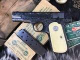 1931 Mfg. Colt Model 1903 Hammerless .32 ACP,
Hand Engraved, Checkered Ivory W/Silver Medallions, Boxed, Trades Welcome. - 23 of 25