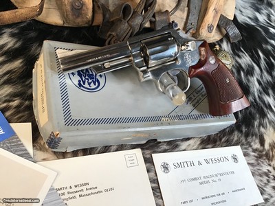 1982 Smith & Wesson Model 19-5, 4”, Nickel Combat Magnum, Boxed.
Trades Welcome.