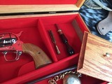 Custom Shop Three Leather Cased Nickel Finished Colt Single Action Army Revolvers with Accessories. Trades Welcome - 13 of 23