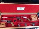 Custom Shop Three Leather Cased Nickel Finished Colt Single Action Army Revolvers with Accessories. Trades Welcome - 12 of 23