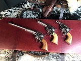 Custom Shop Three Leather Cased Nickel Finished Colt Single Action Army Revolvers with Accessories. Trades Welcome - 23 of 23